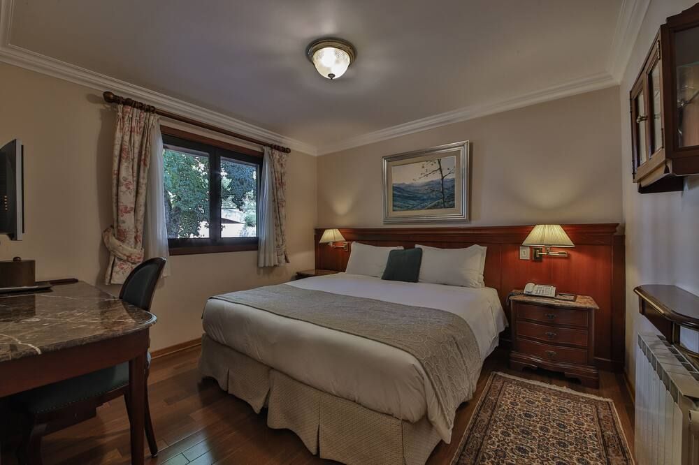Le Suisse Elegance Hotel - קמפוס דו ג'ורדאו - חדר שינה