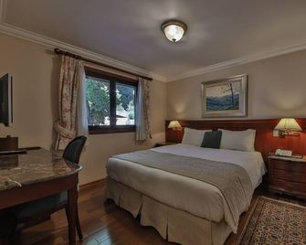 Le Suisse Elegance Hotel - קמפוס דו ג'ורדאו - חדר שינה