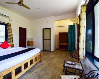 Capital O Mybhumi Agro Resort - Junnar - Bedroom