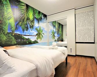 Bali-Peg Luxury Accommodation - Winnipeg - Bedroom