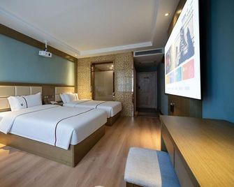 Baili Hotel - Qiandongnan - Bedroom