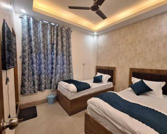 Hotel Yogita Inn - Bodh Gaya - חדר שינה