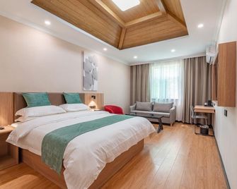 Greentree Inn Shandong Jinan Beiyuan Street Ginza - Jinan - Bedroom