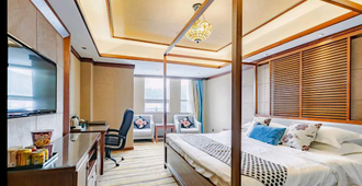 Bin Li Uptown Hotel - Yibin - Bedroom