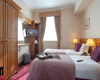 سكولارز تاون هاوس - دروغيدا - غرفة نوم