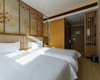 24k International Hotels Nanjing Road Pedestrian Street - Shanghai - Bedroom