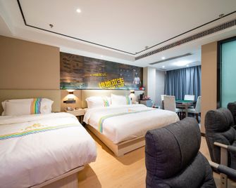 Aegean Hotel Chain (Ganzhou District Government Store) - Ganzhou - Schlafzimmer