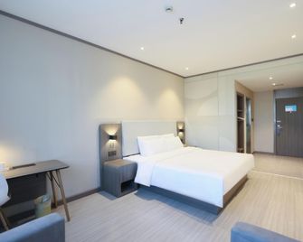 Hanting Hotel Jinan West Market - ז'ינאן - חדר שינה