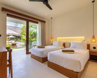 Uryah Hotel Lombok - Kuta - Schlafzimmer