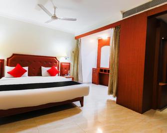 Capital O 49170 King's Royal Palace - Tirunelveli - Bedroom