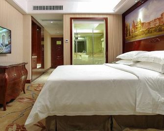 Vienna Hotel Chaozhou Plaza - Chaozhou - Schlafzimmer