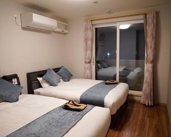 Hakodate Motomachi Guesthouse - Hakodate - Camera da letto