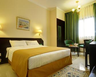 Hotel Al Madinah Holiday - Muscat - Bedroom