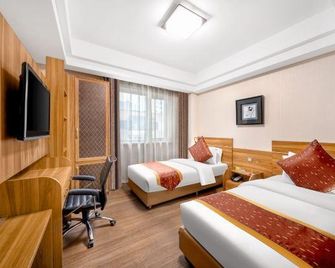 Donglong Hotel - Harbin - Habitación