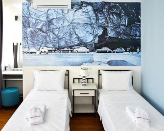 Osten Art Hotel - Skopje - Schlafzimmer