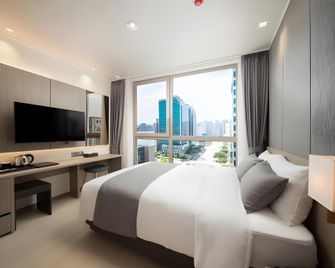 Utop Boutique Hotel and Residence - Kwangdžu - Ložnice