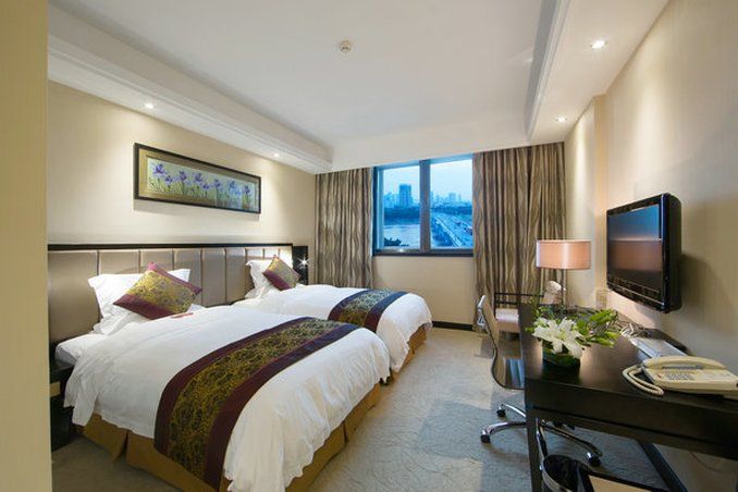 يونجيانج هوتل - ناننينغ - غرفة نوم