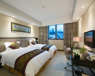 يونجيانج هوتل - ناننينغ - غرفة نوم