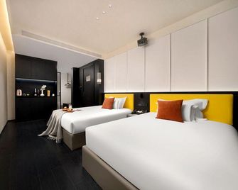 Gujia hotel - Harbin - Bedroom