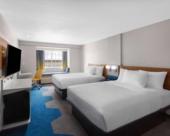 ميكروتل إن آند سويتس باي وندام رابد سيتي - رابيد سيتي - غرفة نوم