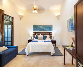 Casa Dos Lirios - Adults Only - מרידה - חדר שינה