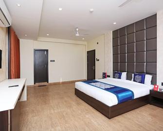 Super Capital O Niharika Guest House - Guwahati - Habitación