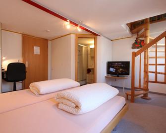 Hotel Alpina - Grächen - Camera da letto