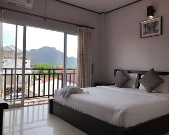 Phou Ang Kham 2 Hotel - Vang Vieng - Bedroom