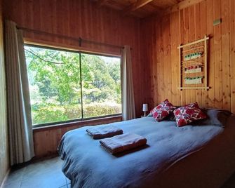Cabin in Coñaripe on the riverbank - Coñaripe - Habitación