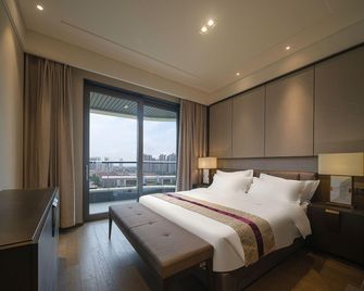 Ouchen International Administrative Mansion Himalaya Branch, Nanbin Road, Chongqing - Chongqing - Camera da letto