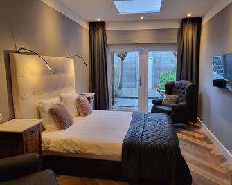 Boutique Hotel Huys van Leyden - Leiden - Schlafzimmer