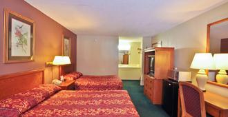 Country Hearth Inn & Suites Marietta - Marietta - Bedroom