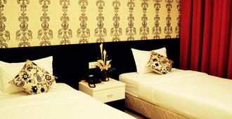 アデル ホテル - コタキナバル - 寝室