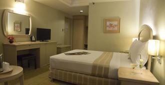 Riviera Mansion Hotel - Manilla - Slaapkamer