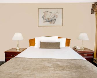 Howard Johnson by Wyndham Downtown Kamloops - קאמלופס - חדר שינה