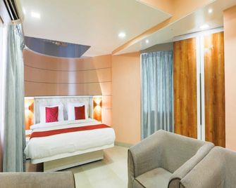 هوتل اي كاي ريجينسي - مومباي - غرفة نوم