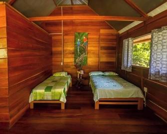 Quirquincho House Lodge - Puerto Maldonado - Slaapkamer