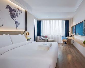 Kyriad Marvelous Hotel (Nanjing Hongqiao Center) - Nanjing - Bedroom