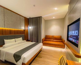 ناتا أزانا هوتل سولو - سوراكارتا - غرفة نوم