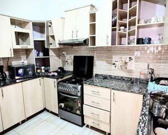 Silver Budget & Travel Accommodation - Kigali - Cocina