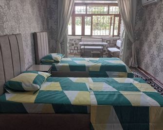 Charming 2-bedroom apartment with AC, WiFi in peaceful Andijon - Andizhan - Bedroom