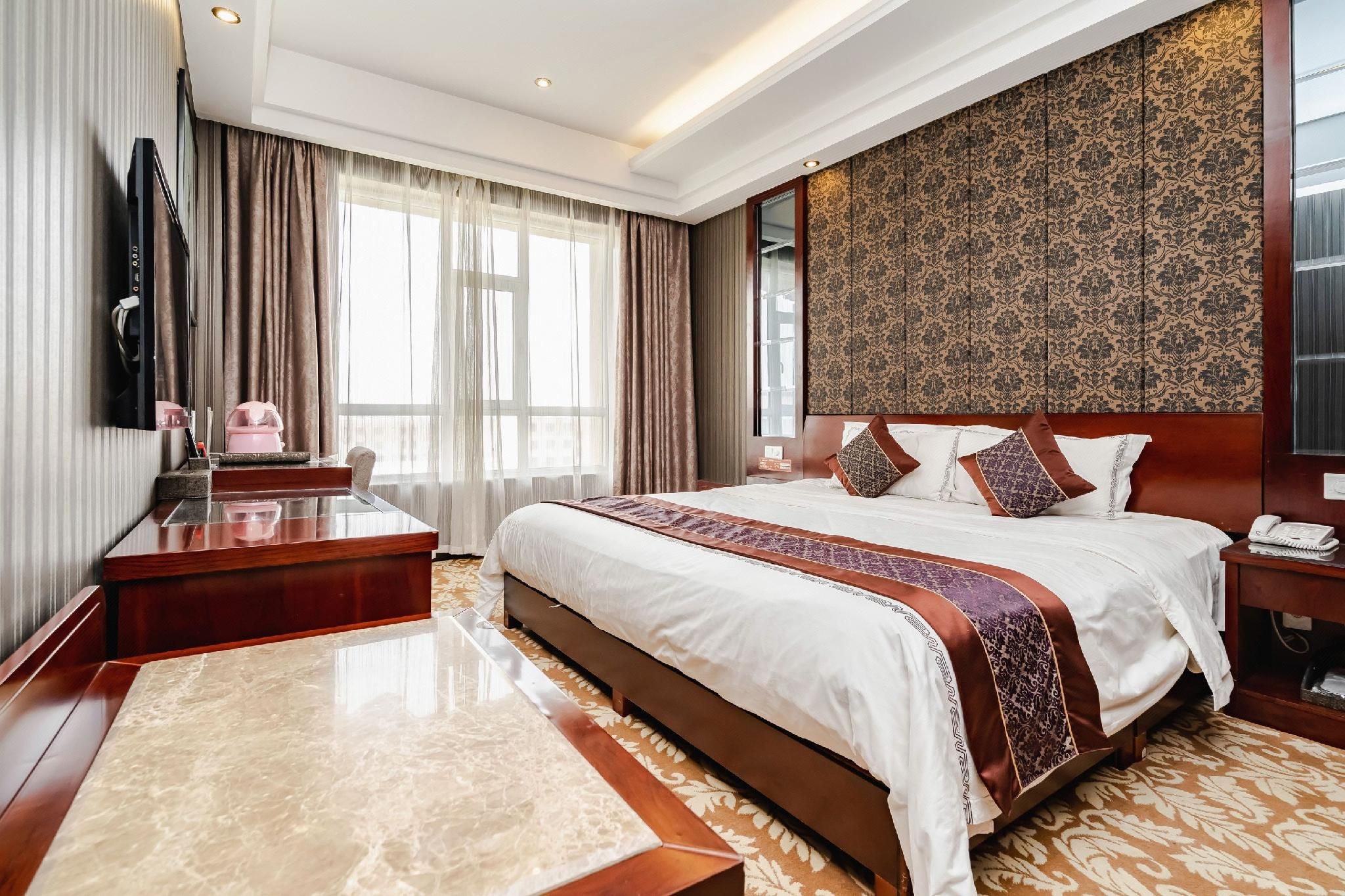 Han Tang · Grand Hotel - זי'יוצ'ואן - חדר שינה