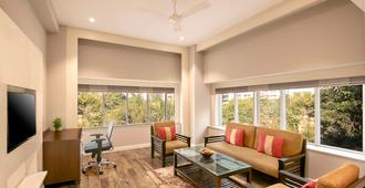 Country Inn & Suites By Radisson Jammu - Jammu - Sala de estar