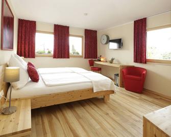 بيو هوتل بايريشر ويرت - اوغسبورغ - غرفة نوم