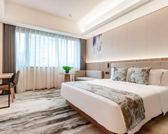 Rezen Hotel Fortune Jiaxing - Jiaxing - Camera da letto