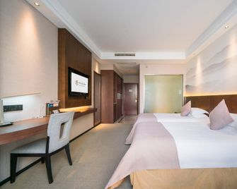 Wassim Hotel Lishui High-Speed Railway Station Zijin Garden - Lishui - Slaapkamer
