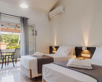 Riposo Studios & Apartments - Kavos - Dormitor