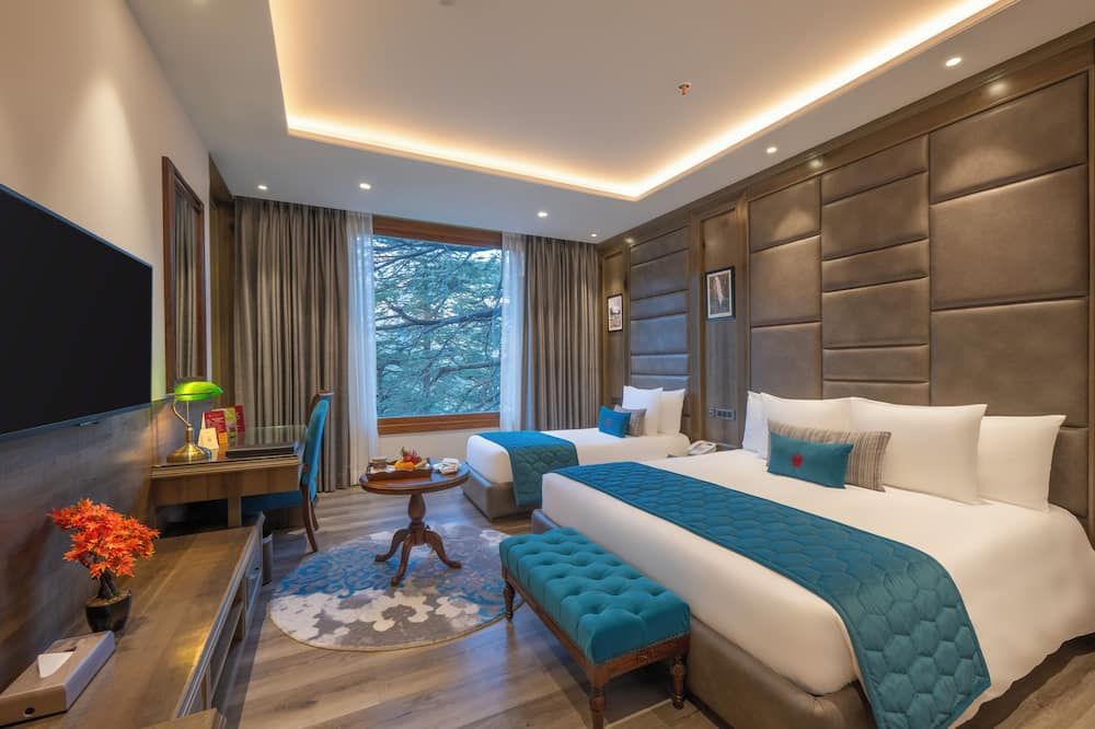 Welcomheritage Elysium Resort & Spa - שימלה - חדר שינה