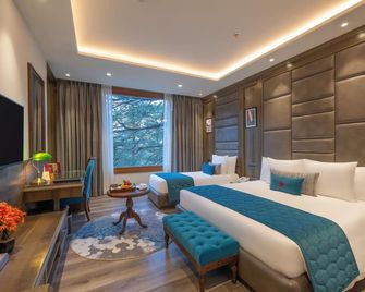 Welcomheritage Elysium Resort & Spa - שימלה - חדר שינה