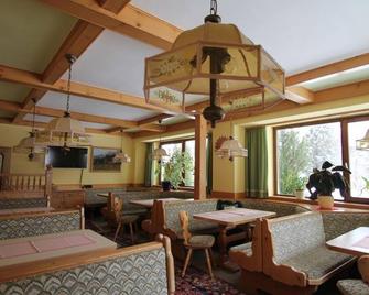 Doppelzimmer mit Balkon - Hubertushof Beim Römerbad - Bad Kleinkirchheim - Restaurante